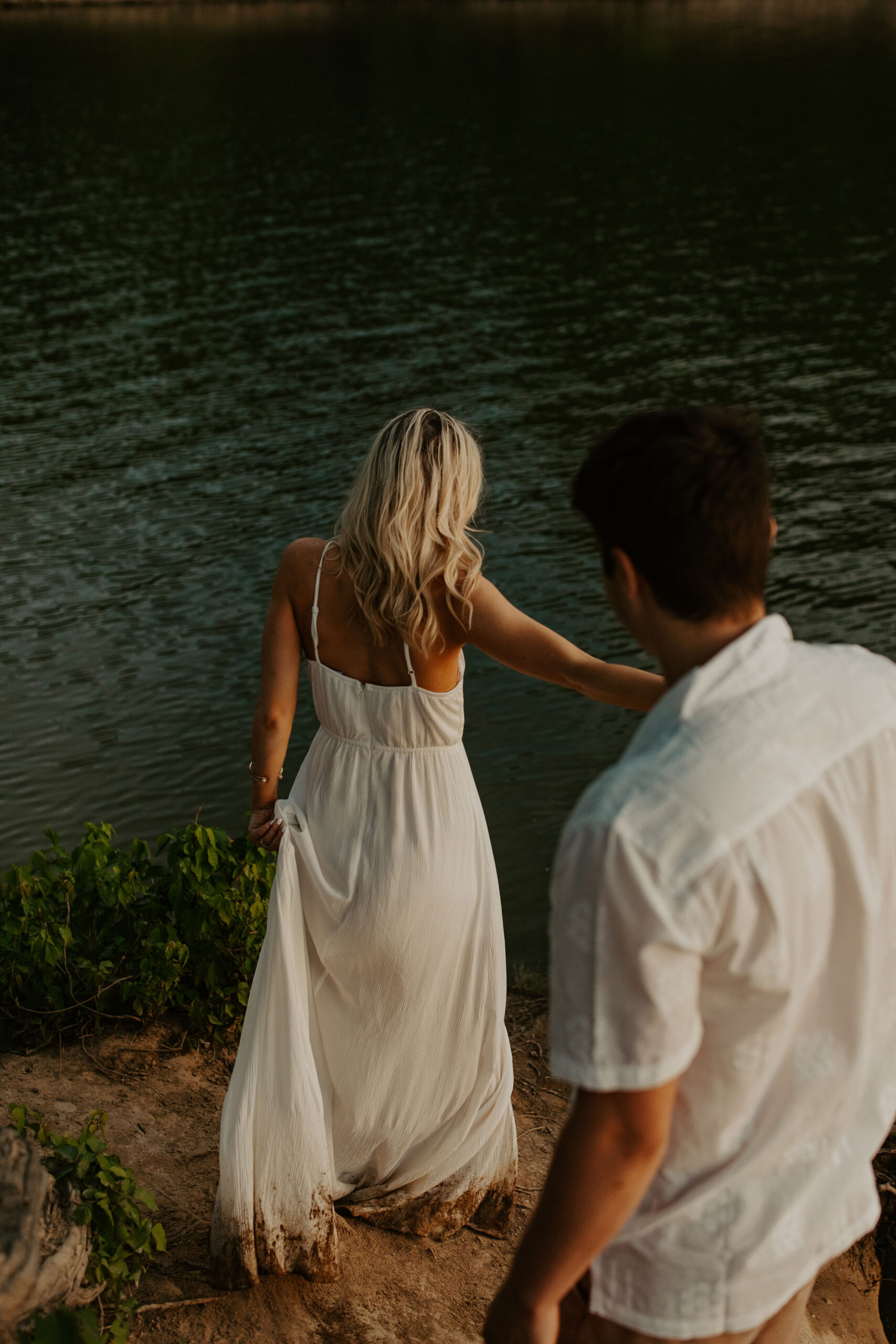 Sunset Engagement Photos at East Fork Lake - Golden Hour Couples Photos. Wearing a White Engagement Session Dress. 
