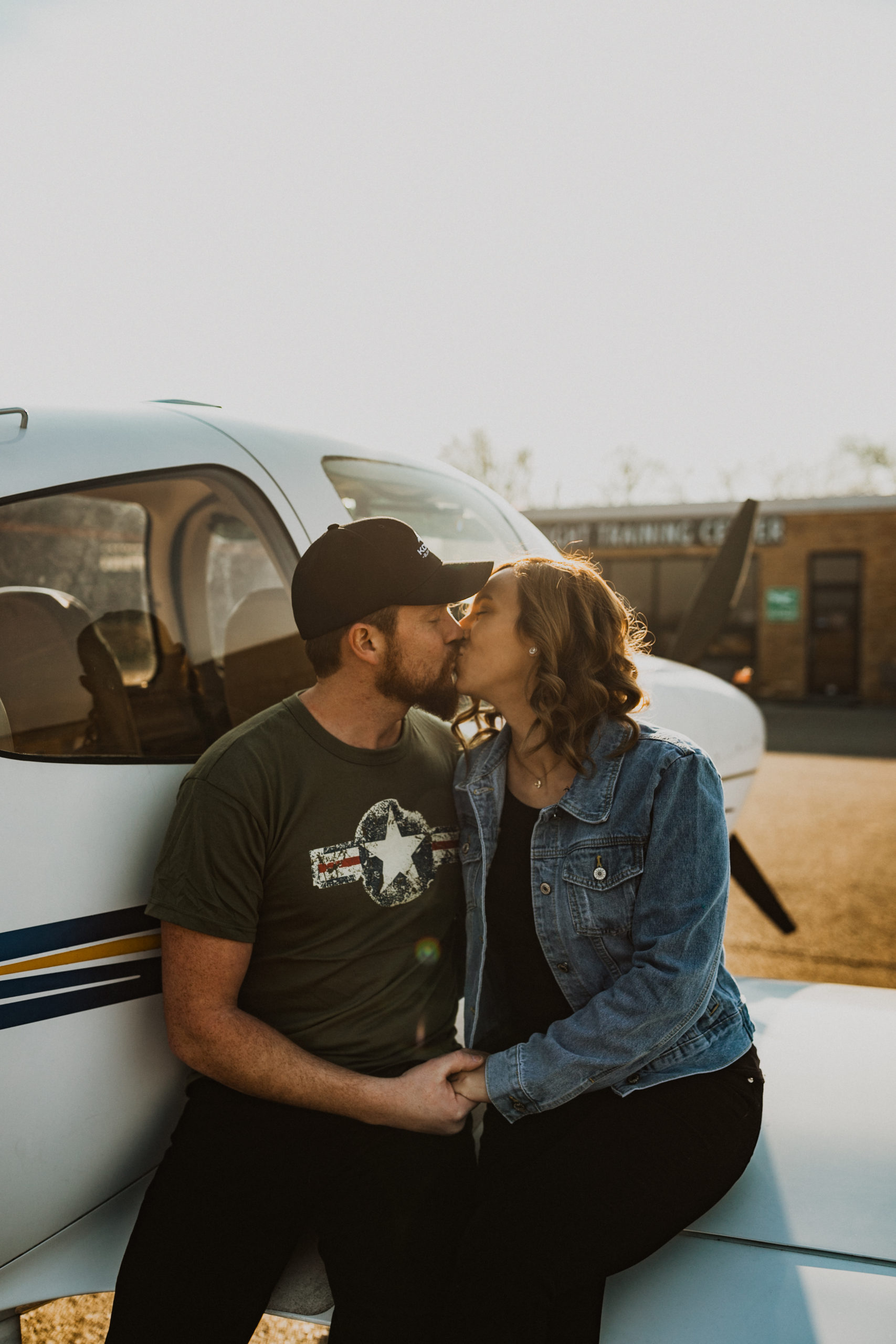 Sunset Engagement Photography  on an Airplane at Lunken Airport in Cincinnati Ohio