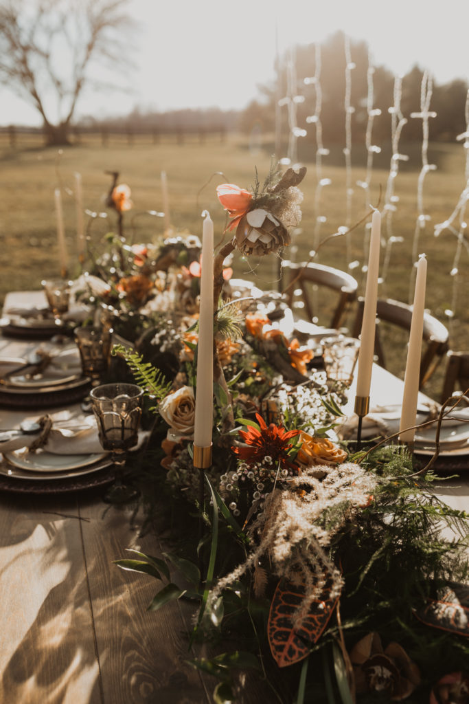 A golden woodsy tablescape for an Ohio forest elopement at sunset at Historic White Oak Farm. 