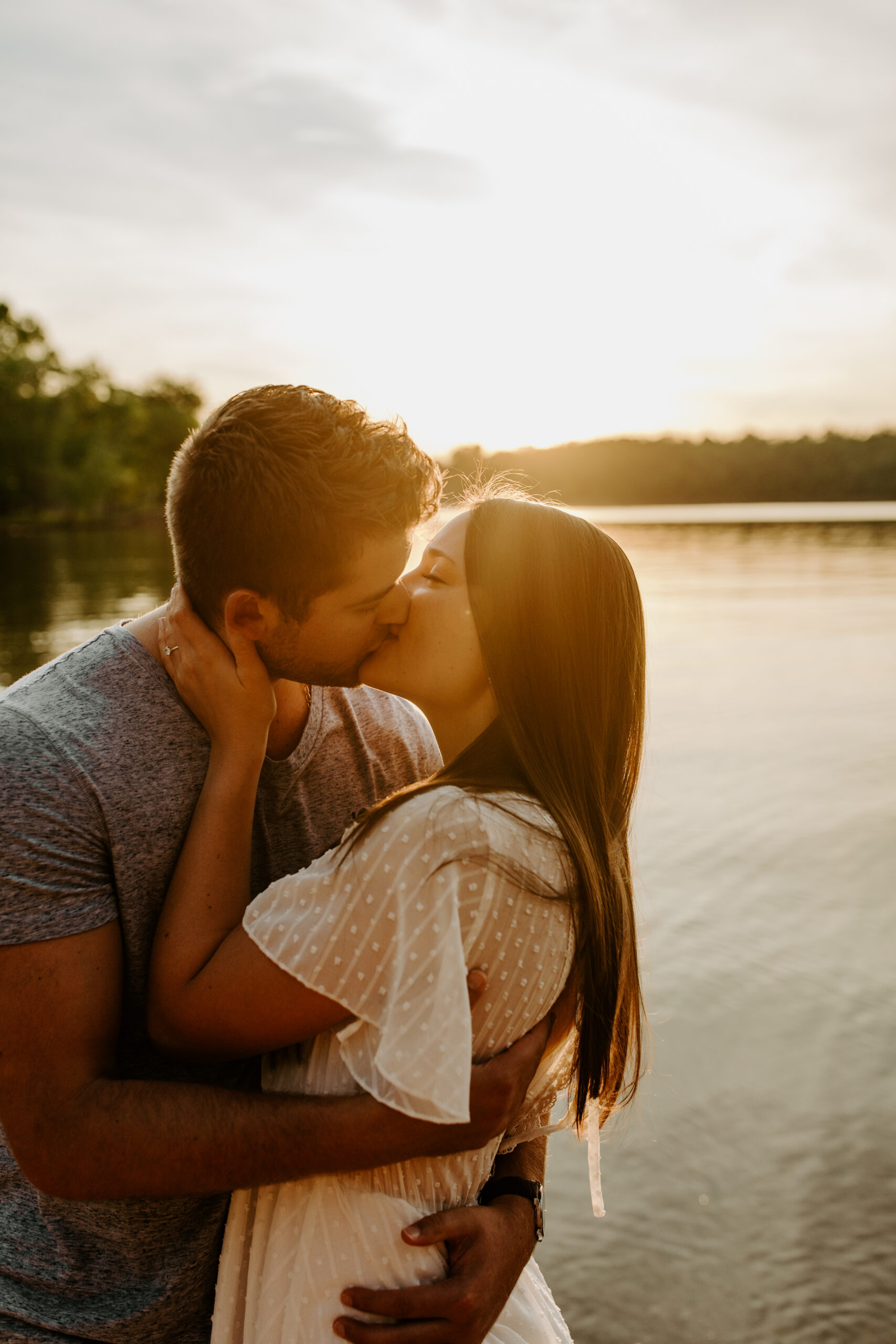 Engagement Photos during golden hour over a lake