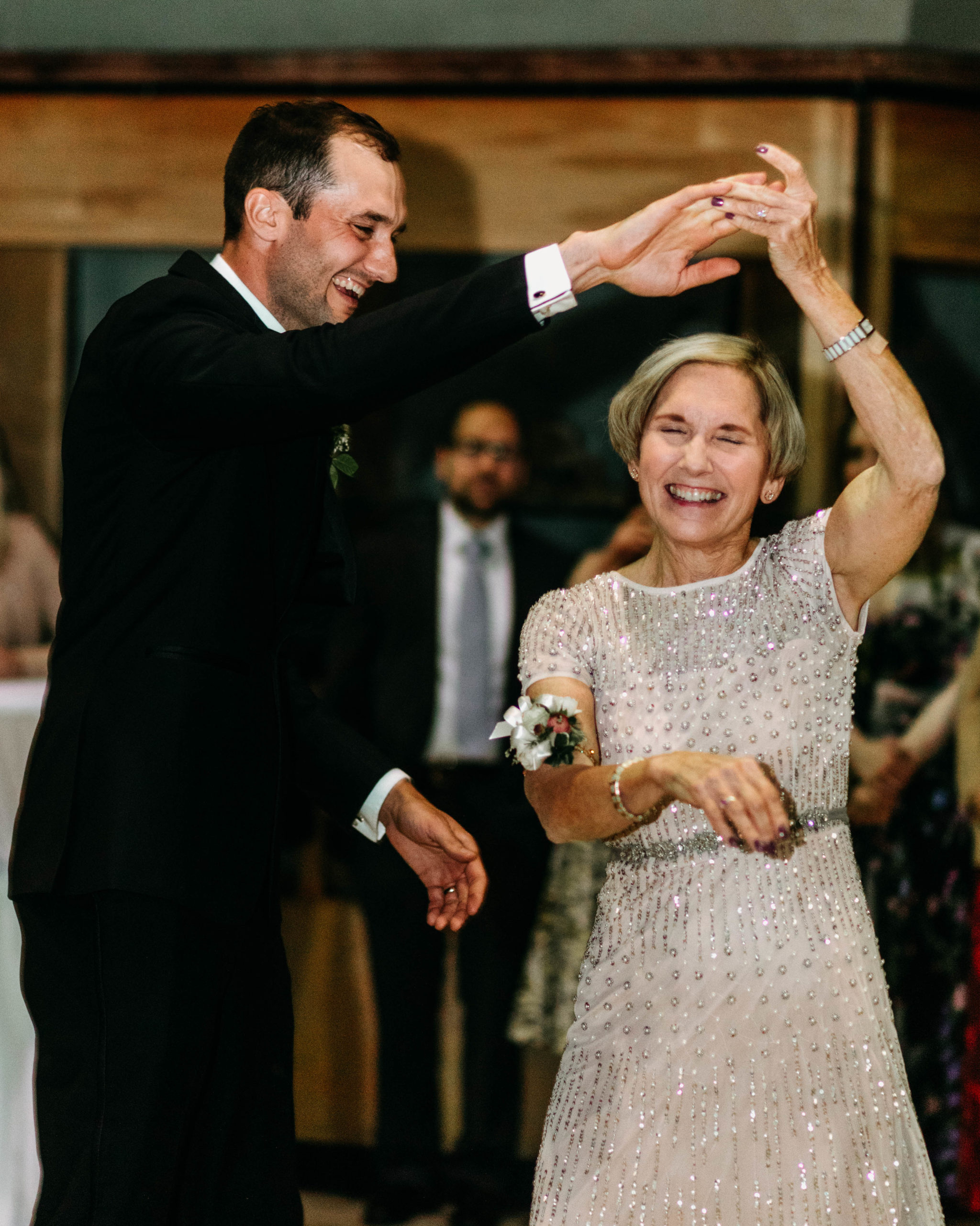 Mother and Son dancing the night away at Krohn Conservatory Wedding
