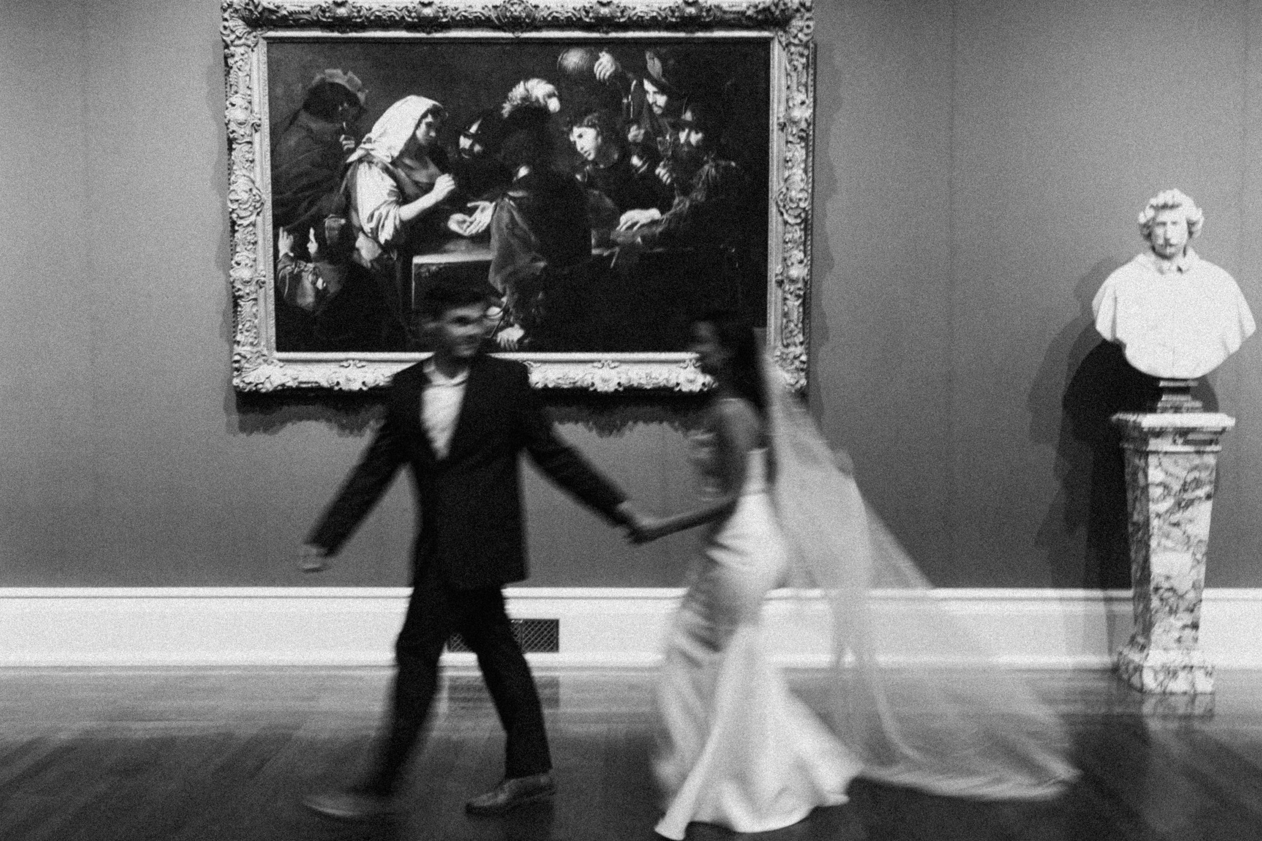 Couple Eloping at art exhibit at the Toledo museum of art in Ohio.