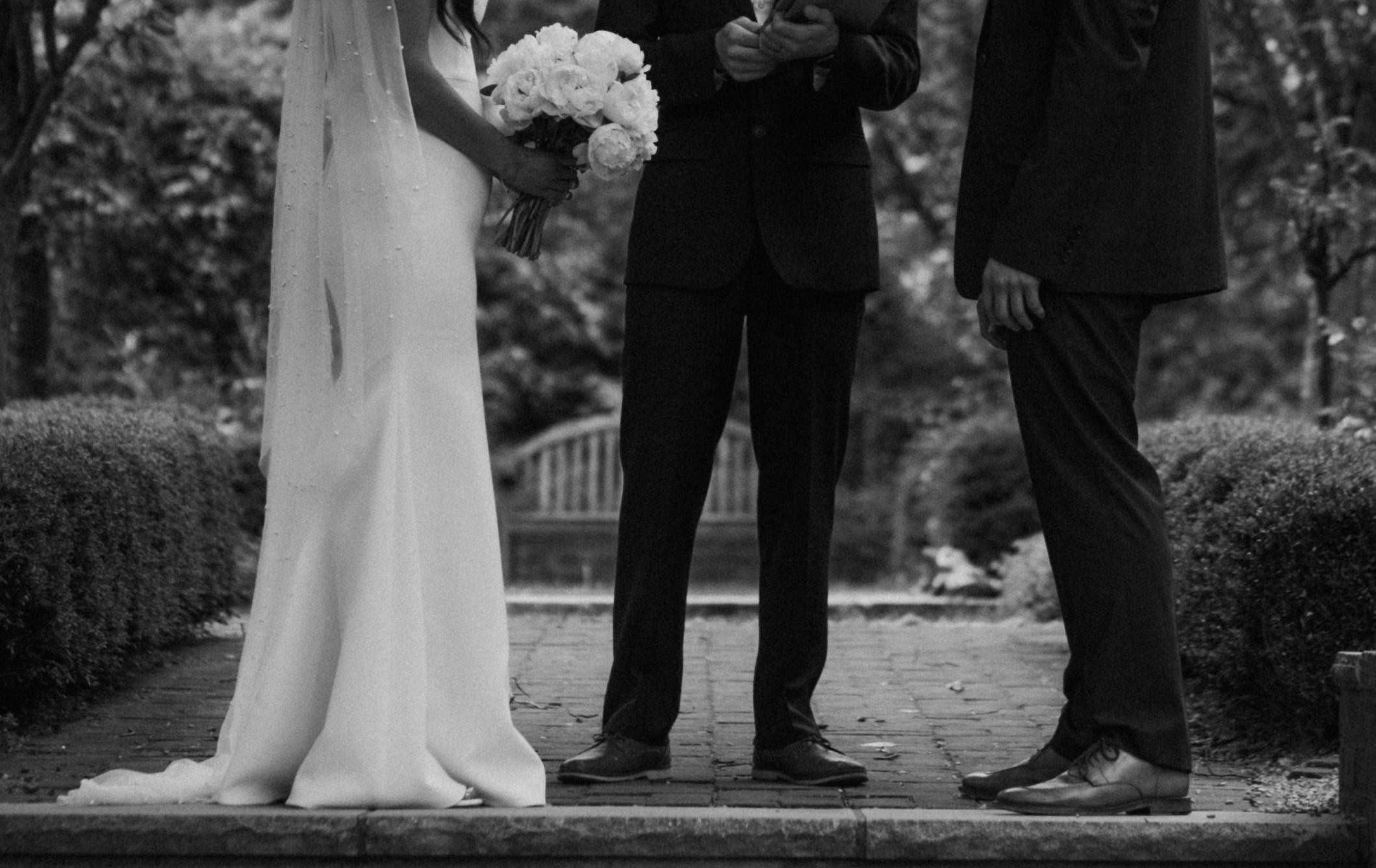 close photo of couple eloping in Toledo, Ohio at the Metropark. Black and white elopement photo of the details. 