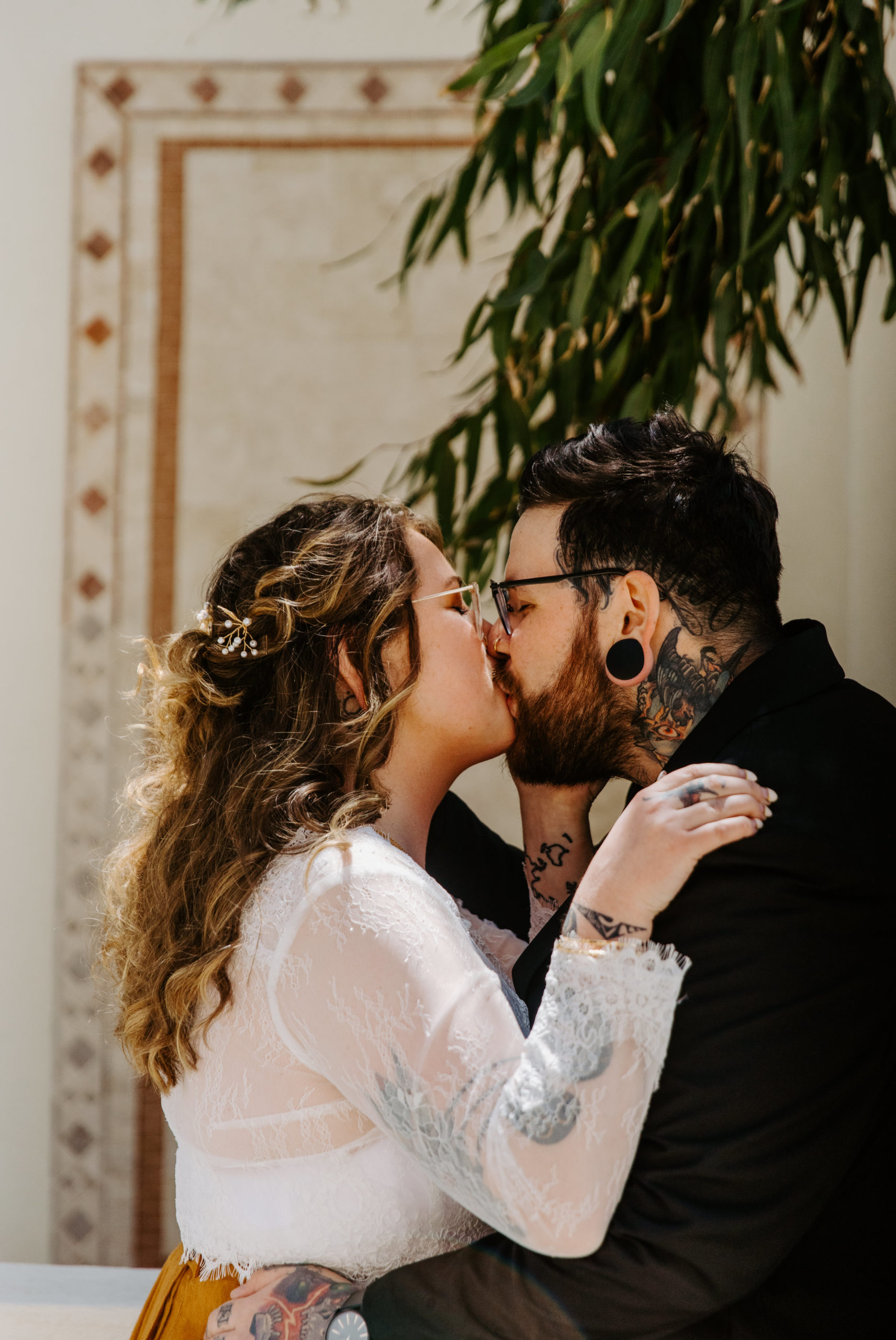 Wedding Couple Kissing on wedding day. They are in San Diego California. Photo by Bare Moments Photography