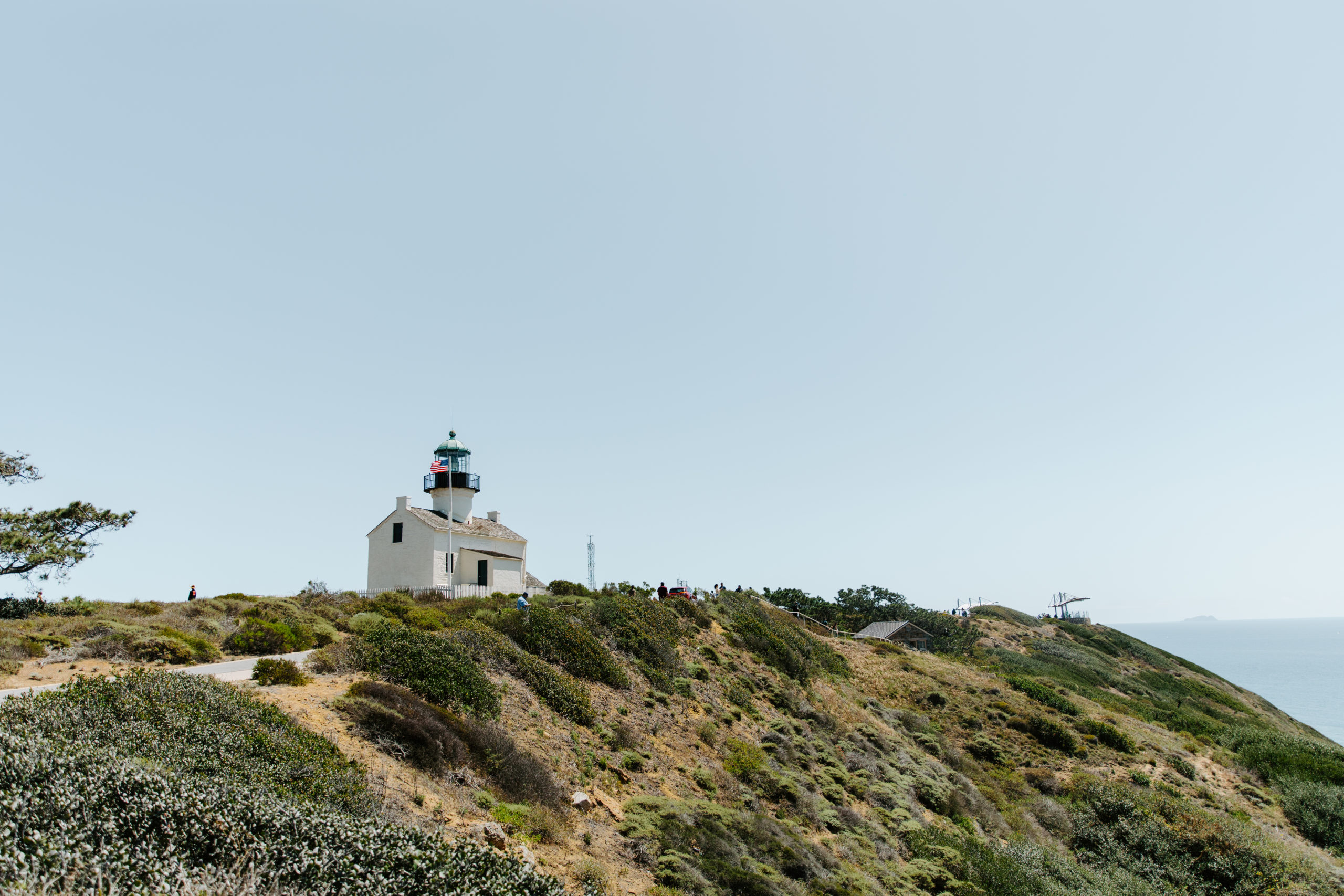 Cabrillo Monument Wedding day Lighthouse on sunny day. Cliffside nature landscape photography of the Monument. 