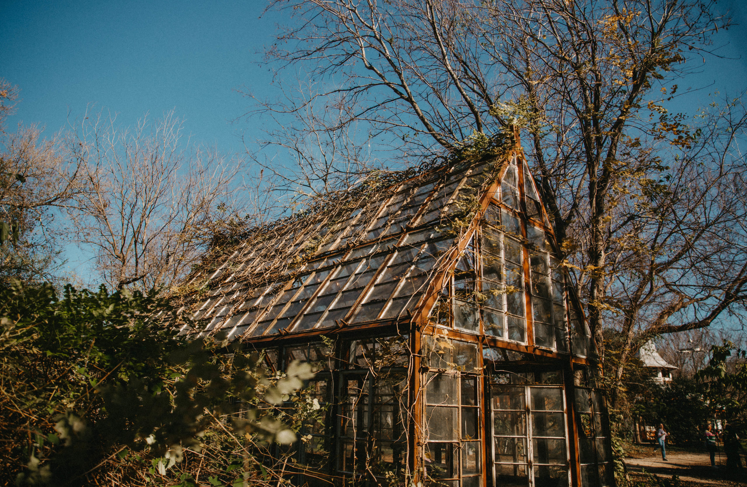 an exterior photo of the Secret Theater Greenhouse Wedding Venue in Austin, Texas. 