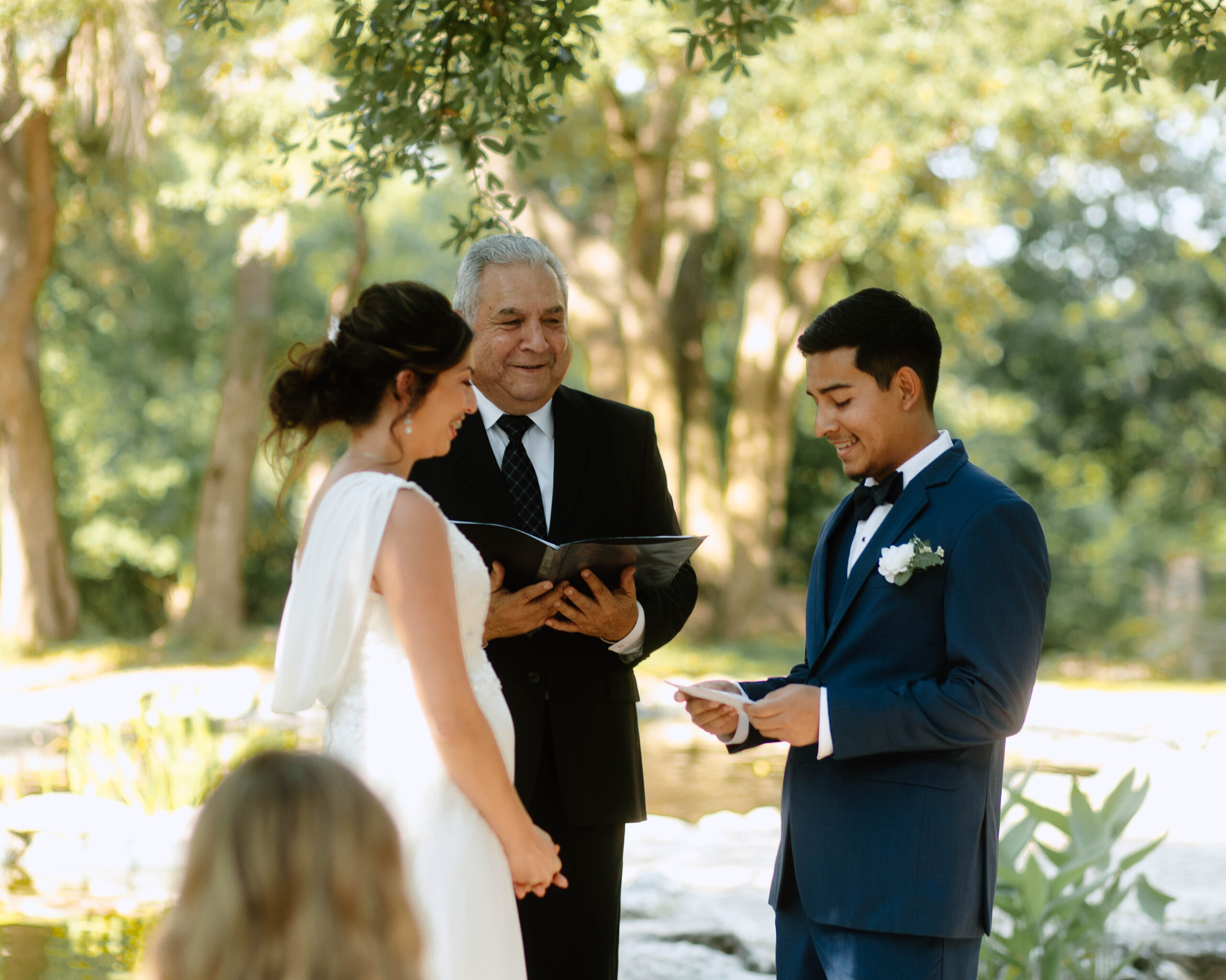 Ceremony Wedding Photography at Mayfield Gardens. Photograph by Bare Moments Photography. Taken during the summer in Austin, Texas. 