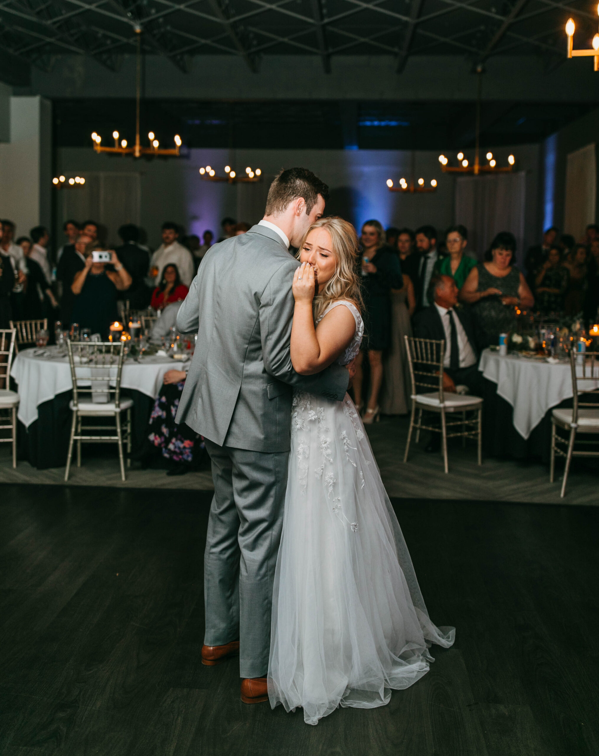 A wedding couple sharing their first dance together at Hotel Covington.