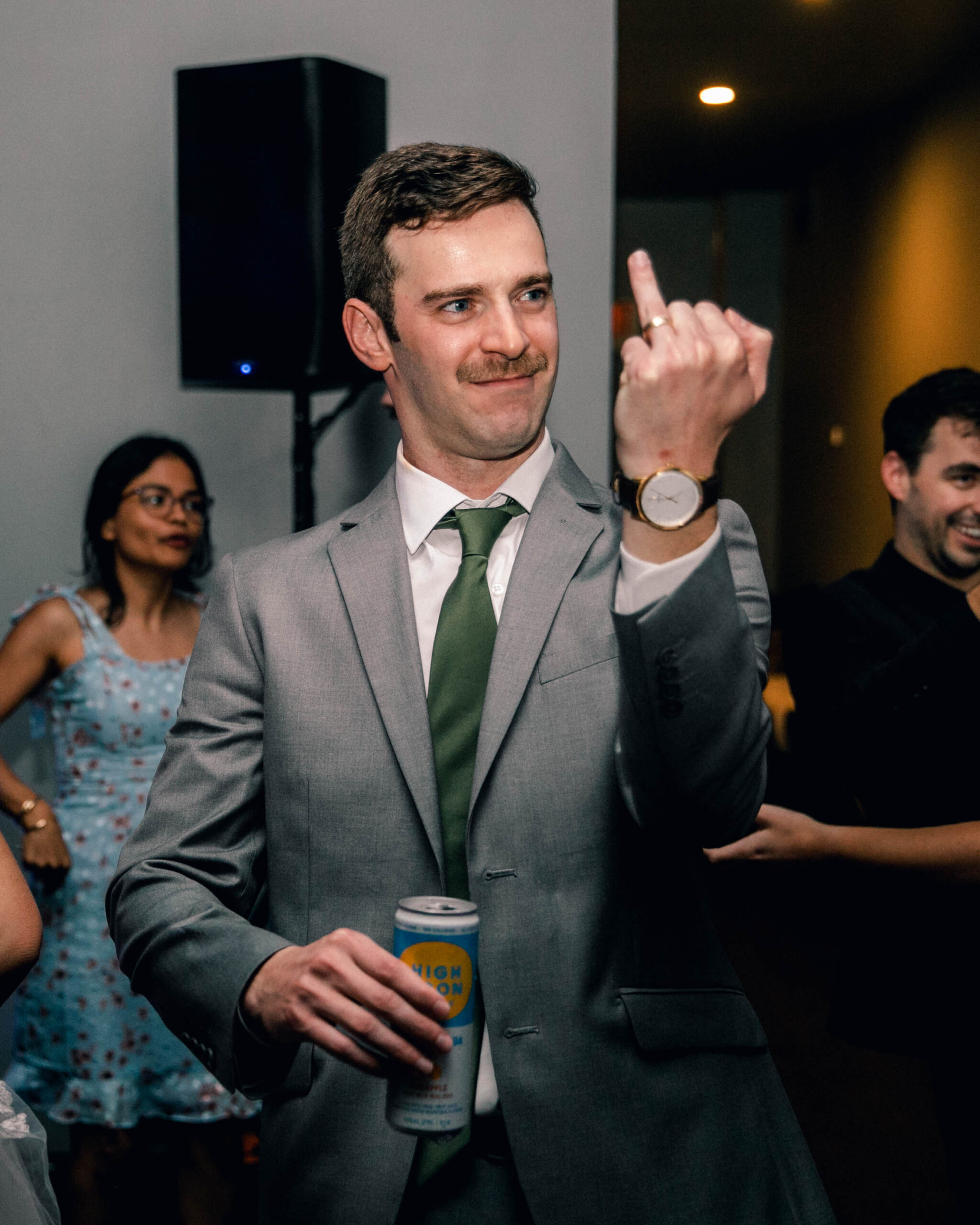 Wedding Reception Documentary Photography - Groom showing off his new wedding ring