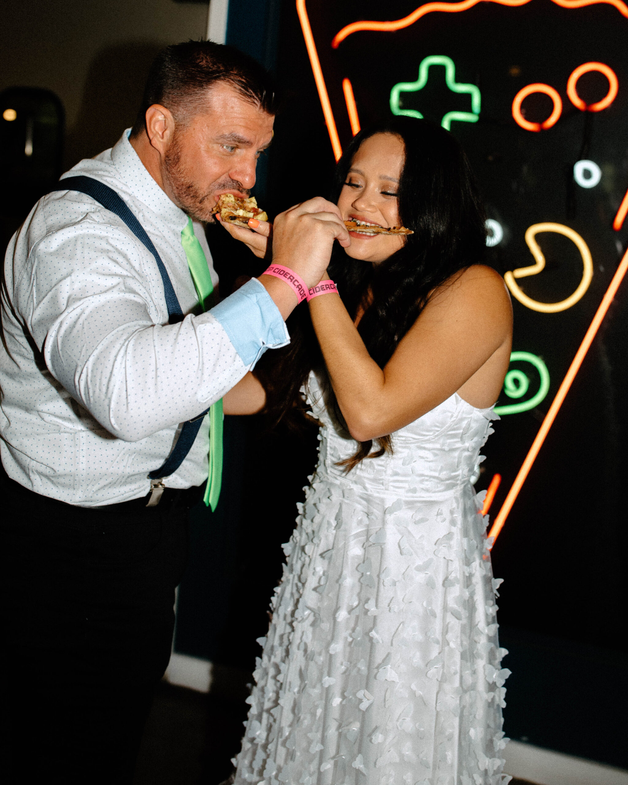 Wedding Photos with Pizza - Wedding Reception flash photographs at arcade bar